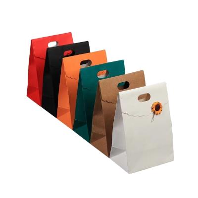 China OEM Recyclable Paper Clamshell Maker Bag Cosmetics Gift Packaging Paper Bag With Your Own Logo for sale