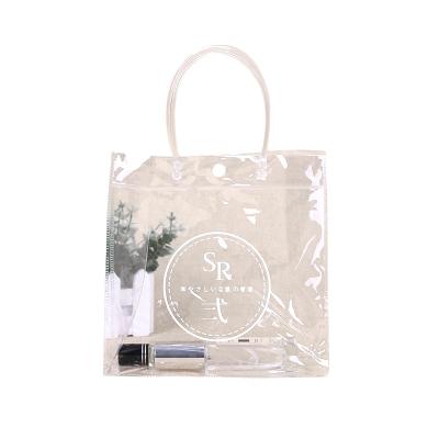 China Lightweight factory price all transparent eco-friendly custom logo waterproof shopping bag gift PVC portable packing bag for sale