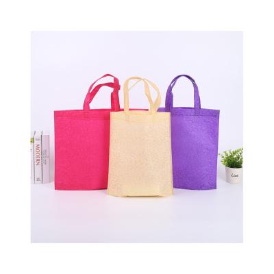 China 100% Recyclable Nonwoven Polypropylene Heavy Duty Fabric Design Designer Carrier Bags for sale