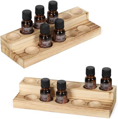 China Viable hot sale wooden double-layer essential oil rack nail polish display stand for sale