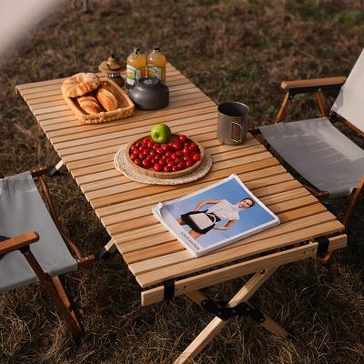 China Minimalist outdoor high quality kids picnic portable beech wood egg roll foldable camping table for sale