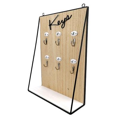 China MDF+IRON Best Selling Head Storage Hanging Board With Metal Shelf for sale