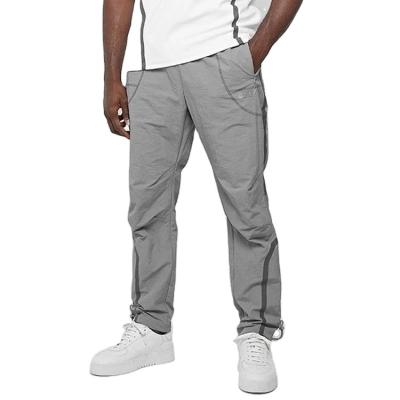 China Cheap Price Custom Logo Men Woven Breathable Stretch Jogger 100%Nylon With Zipper Pockets for sale