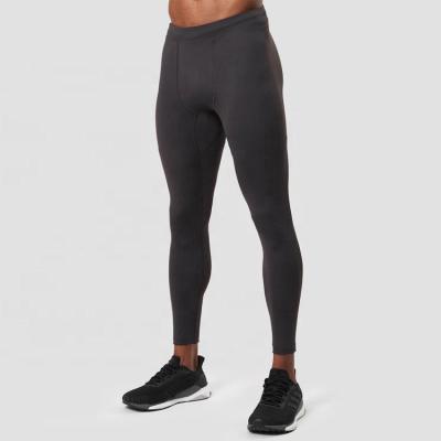 China Custom Made High Quality Breathable Sportswear Gym Legging Tights OEM Logo Polyester Compression Pants Men for sale