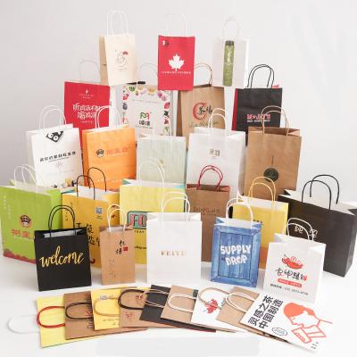 China Recyclable custom bwron white pink kraft paper bag with your own logo shopping bag takeout tea wine gift bag with twist handle for sale