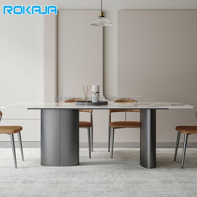 China Italian Minimalist Adjustable Modern Marble Restaurant Dining Table Luxury Designer Stainless Steel Rock Top Dining Table and Chair Set (Other) for sale