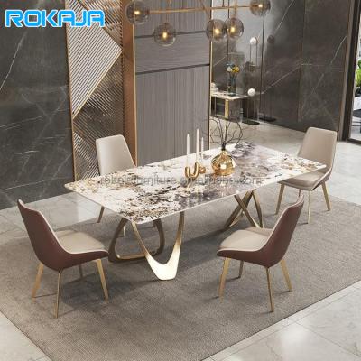 China (Other)Adjustable luxury sintered stone dining table set stainless steel modern dining table gold apartment villa marble top dining table for sale