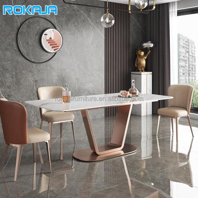 China (Other) Creative Bright Luxury Adjustable Rock Dish Dining Table Dinner Table Set and Rose Gold Stainless Steel Restaurant Chairs Combination for sale