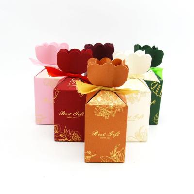 China Recyclable Gold Foil Embossing Recyclable Cardboard Stamping Creative Fishtail Candy Gift Box for sale