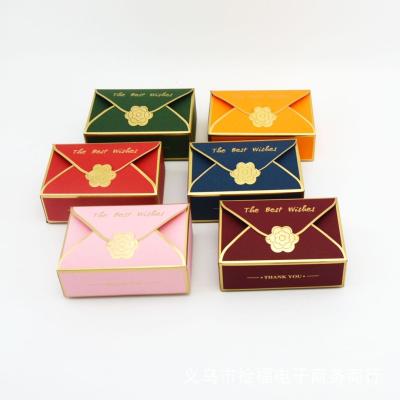 China Recyclable Embossing Gold Foil Stamping Cardboard Varnishing New Creative Candy Square Wedding Gift Box for sale