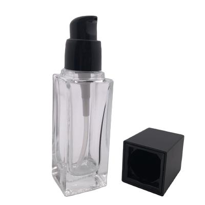 China Personal Care Wholesale Serum Base Bottles Glass 30ml Cosmetic Pump for sale