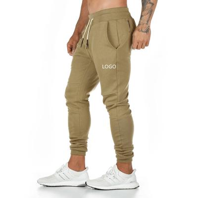 China Khaki 100% Cotton Hanging Towel Anti-Static Mens Sports Running Pants Fitness Pants for sale