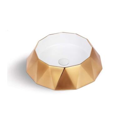 China Modern Rose Gold Color Granite Wash Basin Countertops Flower Design Ceramic Wash Basin for sale