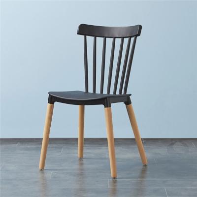 China Factory Free Sample Wholesale Cheap Black Windsor Chair Modern Plastic Dining Chair With Wooden Legs for sale