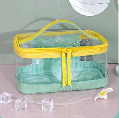 China Custom wholesale transparent waterproof toiletry bag neon logo makeup bag PVC cosmetic bag printing avocado bag for sale