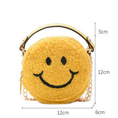 China Hot Sale Waterproof Girls Shoulder Bag With Smile Embroidery Around Tote Bag Plush Kids Handbag for sale