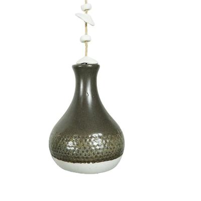 China Europe Ceramic Ornament Custom Wind Chime Round Home Decor Hanging Bell Bell for sale