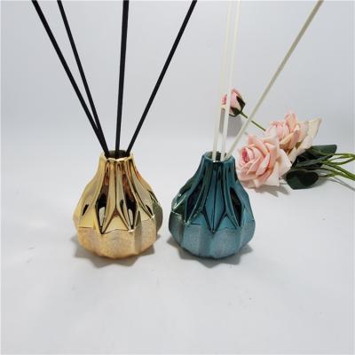 China Custom Home Fragrance Ceramic Empty Essential Oil Diffuser Tubular Bottle Viable For Office for sale