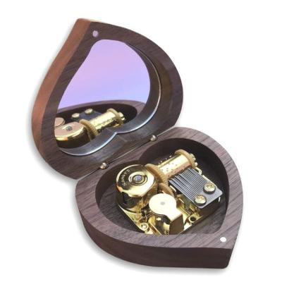 China DIY Proposal Heart Shape Wooden Products Environmentally Friendly Smooth Natural Walnut Solid Wood Music Box for sale