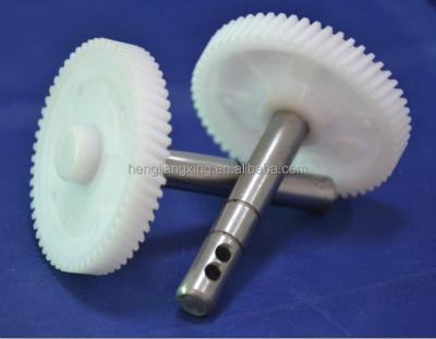 China Plastic POM Bevel Gear In Helical Tooth Profile With Metal Shaft for sale