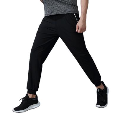 China Hot Sale Breathable T-shirt Men Sport Slim Fit Pants Casual Wear Fashion Men Gym Fitness Pants for sale