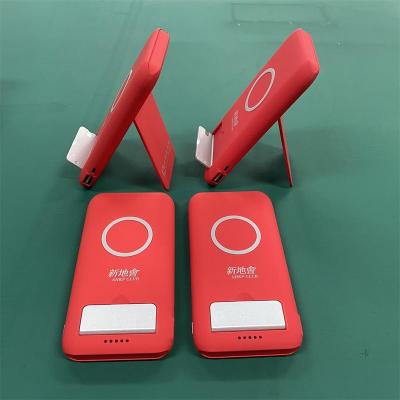 China Radio Charging 3 in 1 Wireless Charger Stand Foldable Phone Holder For Iphone Wireless Charger Power Bank for sale