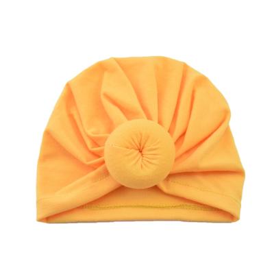 China 2021 New Fashion Baby Product Ideas Donut Bandana Solid Color Sweater Hat Baby Hair Accessories Tied Headband Baby Boy Hats for sale