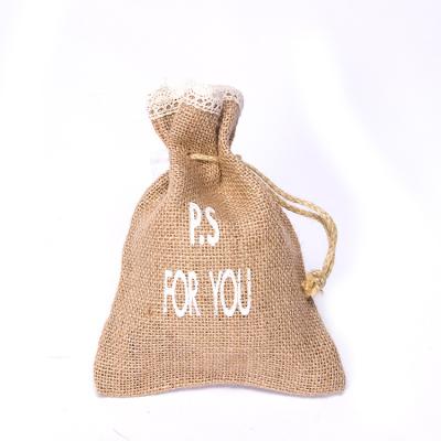 China Recyclable Jute Calico Drawstring Gift Bags Pouch Gift Bag With Personalized Tag for sale