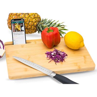 China Viable Wholesale Large Size Cutting Board Wooden Cutting Board With Phone Holder for sale