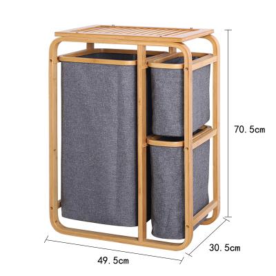 China Traditional Eco Friendly Colthes Storage Basket Bamboo Laundry Basket With Legs for sale