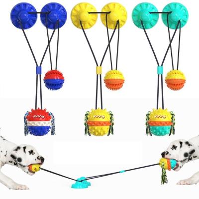 China Viable Designer New TPR Rubber Dog Chewing Ball Double Suction Cup Dog Chew Rope Ball Interactive Pulling Toy For Dog Play for sale