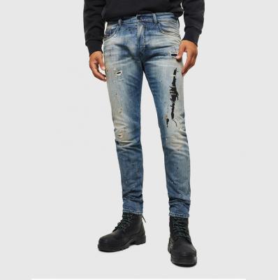 China HUNTW New Breathable Style Man Jeans Splashes Ripped Mens Jeans Ripped Comfotr Mens Jeans for sale