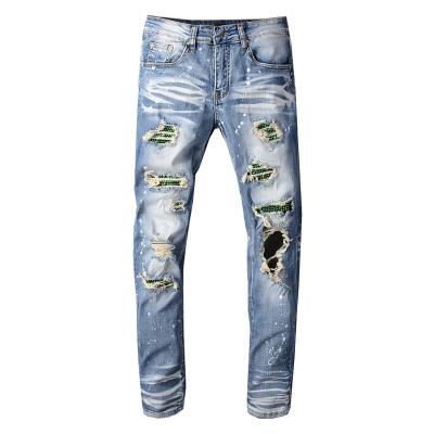 China HUNTW breathable high quality hot selling fashion ripped men's jeans relieve men's jeans for sale