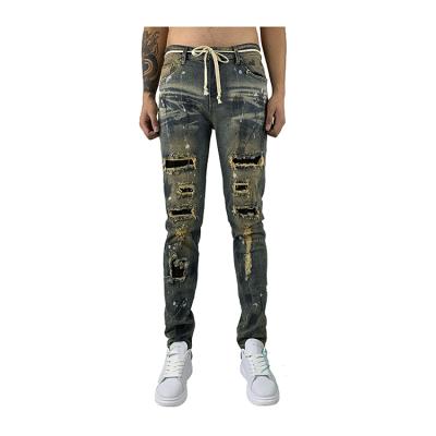 China HUNTW 2020 Breathable Fashionable Splatter Paint Pants Skinny Feet Hole Ripped Jeans for sale