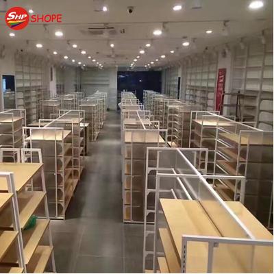 China Double Sided Manufacturer Shelf Shop Wood Display Racks Shelving Like Miniso Style for sale