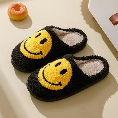 China Breathable Wholesale custom winter fuzzy plush bad bunny Chat Symbol happy smiley face house slippers for sale