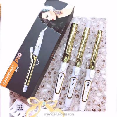 China Popular new design 110-220v fast and temperatue heating returning professional gold ceramic hair curling iron with lights for sale