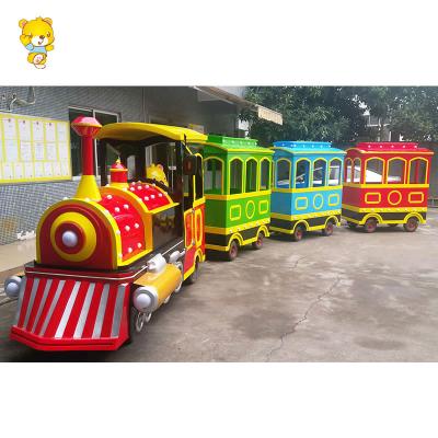 China Classic Fiberglass Vintage Style Amusement Park Trackless Vintage Train Shopping Mall Kid Ride With Three Trolleys for sale