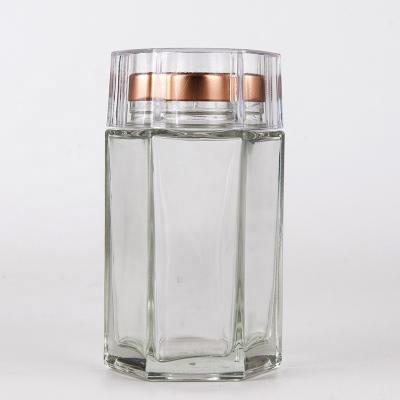 China Sustainable Hot Sale Stocked 50ml Empty Glass Jars With Gold Lids And Plastic Cover for sale