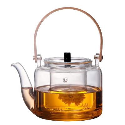 China Sustainable Handmade 1000ml Glass Teapot With Bamboo Handle Stainless Steel Strainer for sale