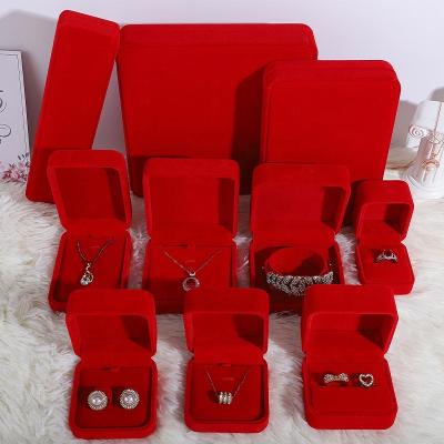 China High Quality Custom Luxury Portable Jewelry Gift Ring Velvet Cream Jewelry Package Red Wine Packaging Boxes Jewelry Boxes for sale