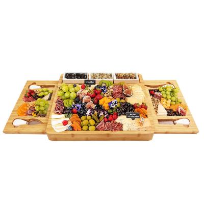 China Sustainable multi sectional elegant large slice ceramic acacia snacks tray charcuterie bamboo and wood cheese board set with knife set for sale