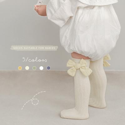 China RTS QUICK DRY Wholesale Korea Young Girls Spanish Knee High Booties High Quality Cotton Sock Soft Bow Booties Kids for sale