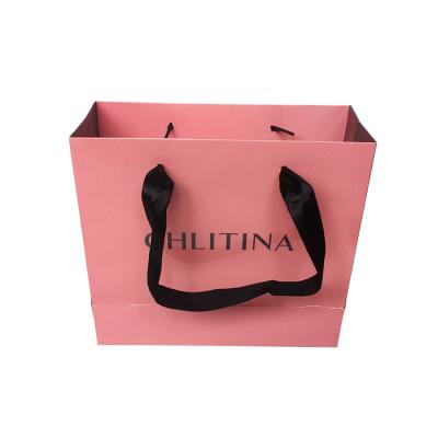 China Handmade Hot Custom Pink Printed Craft Kraft Paper Gift Shopping Paper Bags With Handles for sale