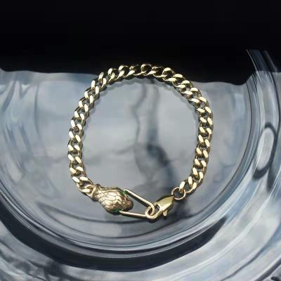 China Fashion Hip Hop Snake Zircon Key Green Eyes 18k Gold Titanium Steel Cuban Bracelet for sale