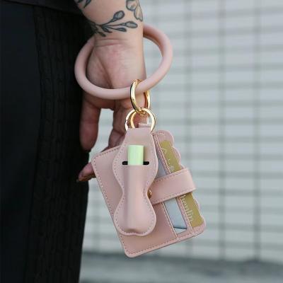 China Popular High Quality Leather Key Ring For Women PU Lipstick Wrist Key Chain Card Bag ID Bag Wristband Key Ring For Women for sale