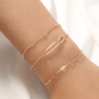 China FASHIONABLE Diamond Multilayer Gold Plated Chain Pin Paperclip Lattice Chain Bracelet for sale