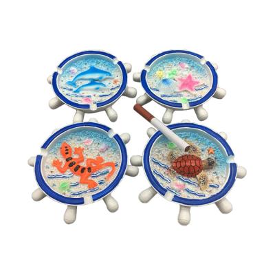 China Custom logo round beach style sand beach newest design smokeless ashtray for sale