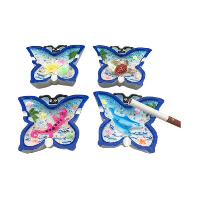 China Special Hot Selling Blue Beach Butterfly Appearance Ashtray Mobile , Portable Glass Ashtray Custom Logo for sale