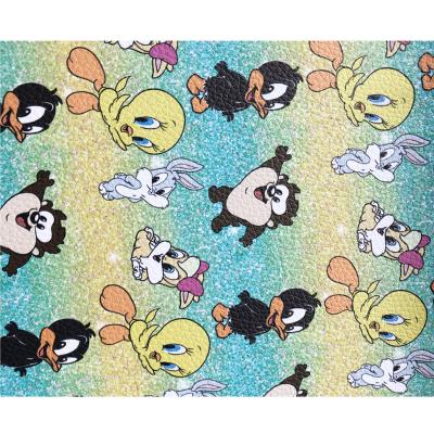 China Quality Cartoon Custom Faux Leather Fabric Waterproof Guaranteed Synthetic For Clothes for sale